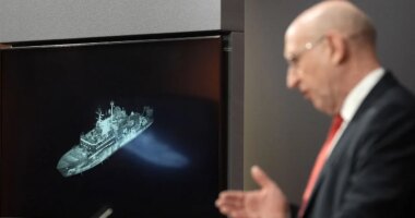 Britain says Russian spy ship is on edge of UK waters; defense secretary issues warning to Putin