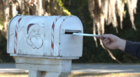 Burton firefighters plant mailboxes for letters to Santa