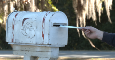 Burton firefighters plant mailboxes for letters to Santa