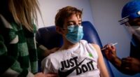12 year old children having their first COVID-19 jab. 13 September 2021.