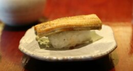 FILE - In this Thursday, July 20, 2017 photo, a dish of eel nigiri is served at Miyake, a Japanese restaurant, in Portland, Maine. (AP Photo/Robert F. Bukaty, File)