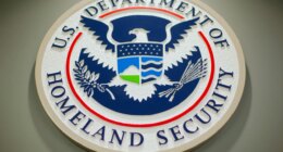 FILE - The Department of Homeland Security logo is seen during a news conference in Washington, Feb. 25, 2015. (AP Photo/Pablo Martinez Monsivais, File)