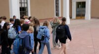 Lisa Nordstrum, a history teacher at Santa Fe Preparatory School, walks with her seventh-grade history class during a field trip outside of the New Mexico State Capitol, Wednesday, Oct. 8, 2025, in Santa Fe, N.M. (AP Photo/Stacy Thacker)
