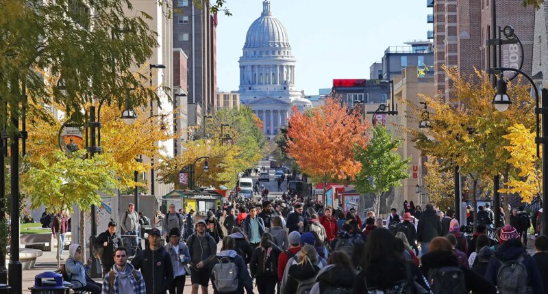 Graphic anti-ICE imagery at University of Wisconsin shows agent with bullet in head: 'Speak their language'
