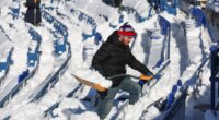 FILE - A stadium worker clears snow from seats before an NFL wild-card playoff football game between the Buffalo Bills and the Pittsburgh Steelers, Jan. 15, 2024, in Buffalo, N.Y. (AP Photo/Jeffrey T. Barnes, File)