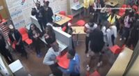 Halloween brawl at Domino's caught on camera, Glassboro, New Jersey police say officer hurt after chair thrown