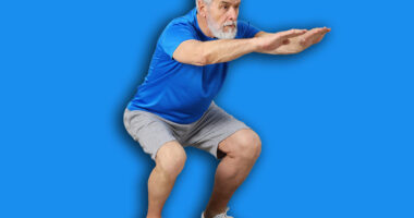 Elderly man exercising at home. Healthy leisure