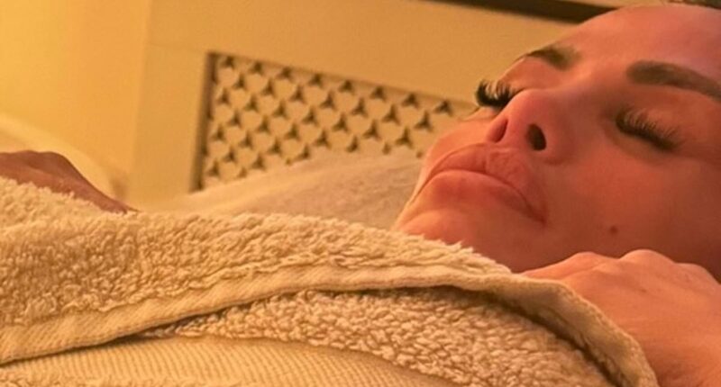 Katie Price displays her extremely tiny waist