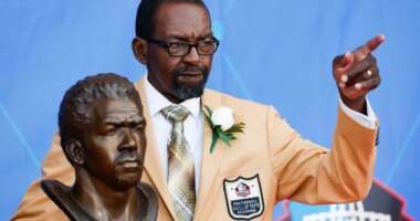 FILE - Former NFL player Kenny Easley poses with a bust of himself during an induction ceremony at the Pro Football Hall of Fame, Saturday, Aug. 5, 2017, in Canton, Ohio. (AP Photo/Ron Schwane, File)
