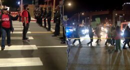 LAX travelers abandon cars, walk to airport as protesters block building during Thanksgiving rush