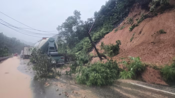 Landslide strikes bus on mountain pass in Vietnam, killing 6, as heavy rain persists