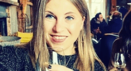 A woman who died in hospital after an alleged domestic violence incident at an apartment in Sydney's east has been identified as Claire Austin.