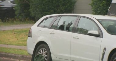 Over a dozen bullets were fired at the white Holden.