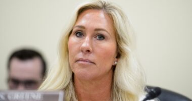 Marjorie Taylor Greene says she is resigning from Congress in January