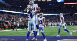 Dallas Cowboys defensive end Marshawn Kneeland and defensive end Sam Williams celebrate a touchdown