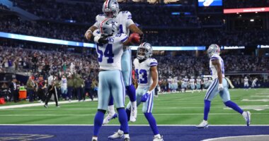 Dallas Cowboys defensive end Marshawn Kneeland and defensive end Sam Williams celebrate a touchdown
