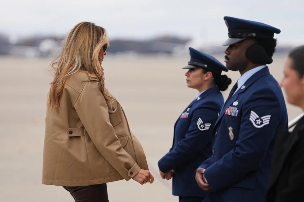 First lady Melania Trump, boards a plane at Joint Base Andrews, Md., en route to Camp Lejeune, Wednesday, Nov. 19, 2025. (AP Photo/Matt Rourke)