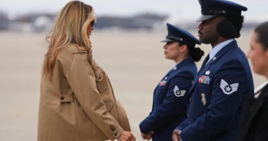 First lady Melania Trump, boards a plane at Joint Base Andrews, Md., en route to Camp Lejeune, Wednesday, Nov. 19, 2025. (AP Photo/Matt Rourke)