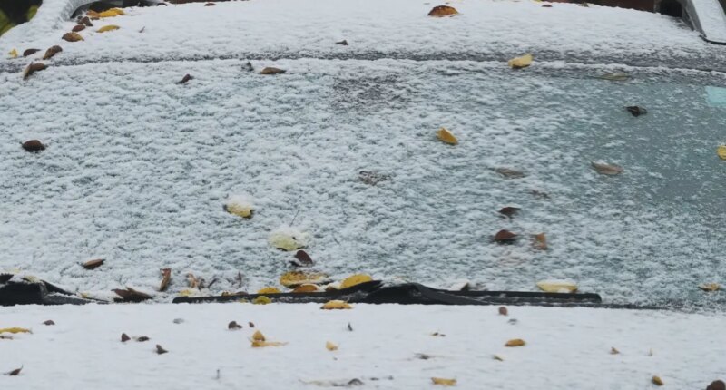 A car is covered with snow during a cold day in Evanston, Ill., Sunday, Nov. 9, 2025. (AP Photo/Nam Y. Huh)