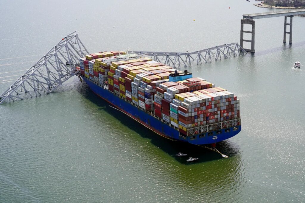 FILE - In this photo provided by the Maryland National Guard, the cargo ship Dali is stuck under part of the structure of the Francis Scott Key Bridge after the ship hit the bridge March 26, 2024, in Baltimore. (Maryland National Guard via AP, File)