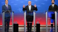 Republican candidate Curtis Sliwa, center, speaks during a mayoral debate with independent candidate former New York Gov. Andrew Cuomo, left, and Democratic candidate Zohran Mamdani, Thursday, Oct. 16, 2025, in New York. (AP Photo/Angelina Katsanis, Pool)