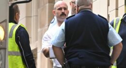 Thomas Sewell (centre) arrives to the Supreme Court of Victoria in Melbourne today.