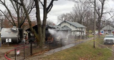 One hospitalized in garage fire with 75-foot flames in Clinton