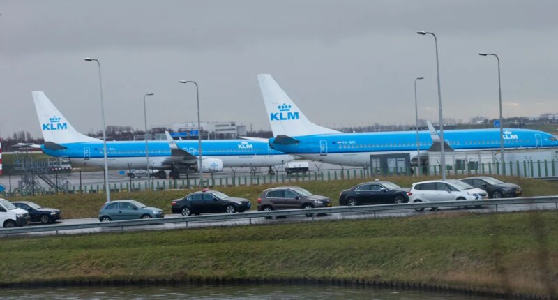 FILE - KLM airplanes sit in Schiphol Airport near Amsterdam, Netherlands, on Jan. 18, 2018. The Dutch government has systematically put the interests of the aviation sector above those of people who live near Schiphol Airport, one of Europe