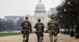 National Guard patrol along the National Mall in front of the Capitol, Wednesday, Nov. 26, 2025, in Washington. (AP Photo/Rahmat Gul)