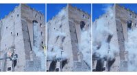 Rescuers work to reach worker trapped in medieval tower that partially collapsed in Rome
