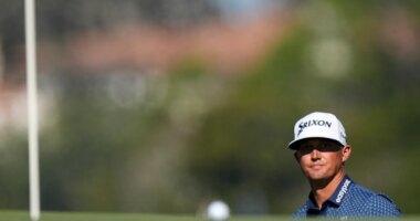 Max McGreevy views his ball on the first green during the final round of the RSM Classic golf tournament, Sunday, Nov. 23, 2025, in St. Simons Island, Ga. (AP Photo/Mike Stewart)