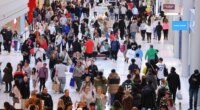 Shoppers browse through stores at Mall of America for Black Friday deals, Friday, Nov. 28, 2025, in Bloomington, Minn. (AP Photo/Adam Bettcher)