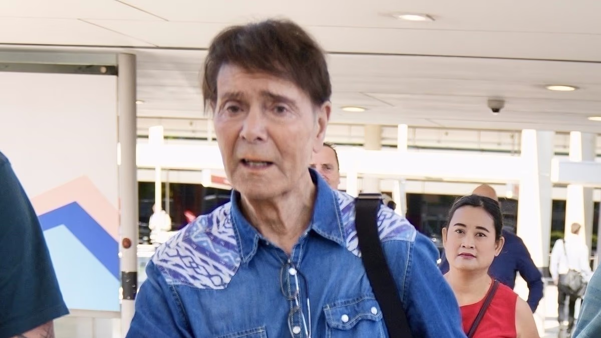 Sir Cliff Richard proves he's still got it at 85 as veteran singer wears a trendy double denim outfit ahead of his final Australian tour date in Brisbane