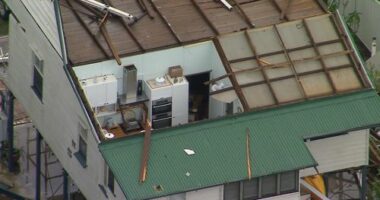 Storms rip off roofs, dump monster hail and leave 150,000 without power