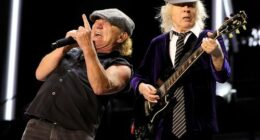 Brian Johnson (L) and Angus Young of AC/DC