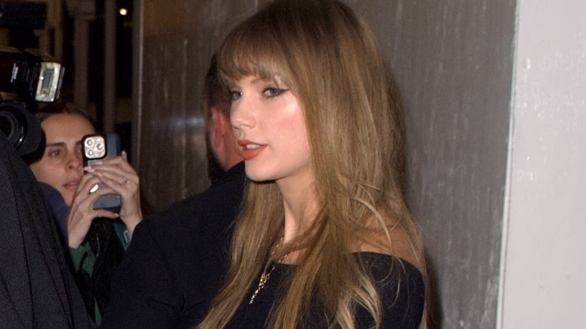 Taylor Swift holds hands with Travis Kelce on rare date night