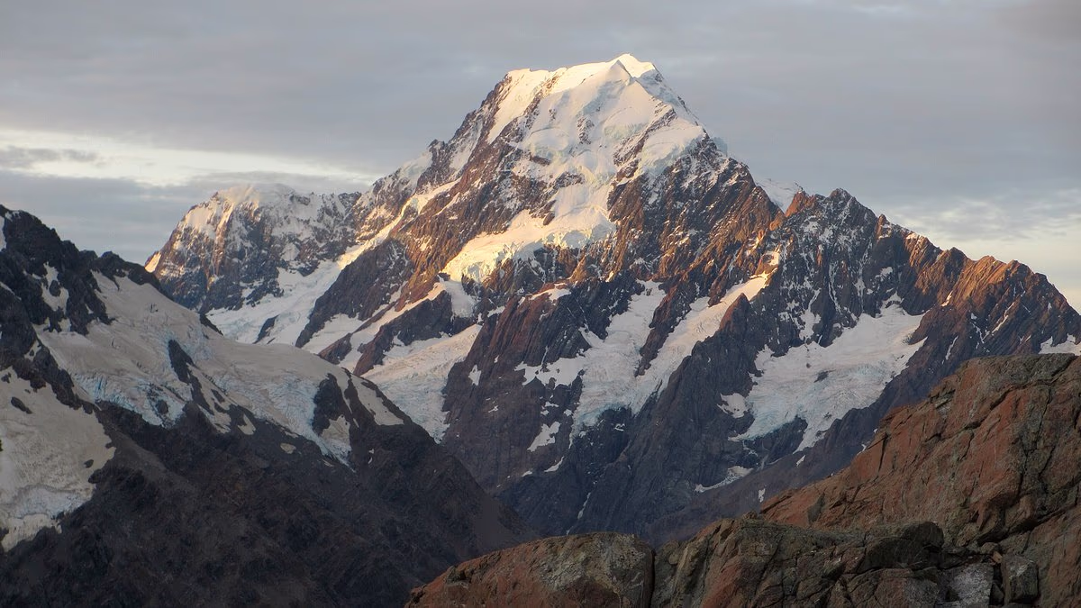 Terror on New Zealand's highest mountain as two climbers die in fall, sparking rescue mission for two others