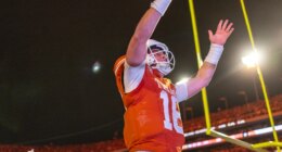 Texas quarterback Arch Manning (16) celebrated a touchdown against Texas A&M during the second half of an NCAA college football game Friday, Nov. 28, 2025, in Austin, Texas. (AP Photo/Stephen Spillman)