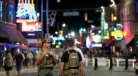 FILE - Federal law enforcement agents walk on Beale Street, Oct. 10, 2025, in Memphis, Tenn. (AP Photo/George Walker IV, File)