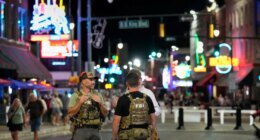 FILE - Federal law enforcement agents walk on Beale Street, Oct. 10, 2025, in Memphis, Tenn. (AP Photo/George Walker IV, File)
