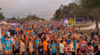 Thousands of runners cross the Clearwater Turkey Trot finish line, several charities benefit