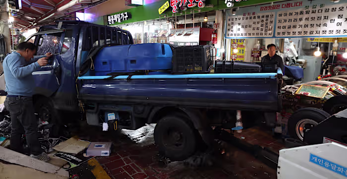 Truck hits pedestrians in South Korea market, killing 2 people and injuring 18