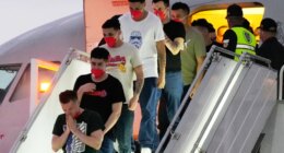 FILE - Migrants deported months before by the United States to El Salvador under the Trump administration