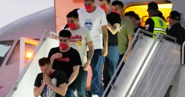 FILE - Migrants deported months before by the United States to El Salvador under the Trump administration