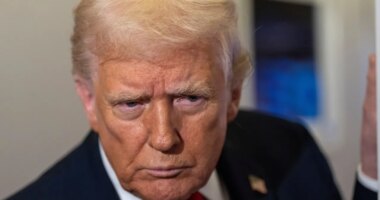 President Donald Trump leans in to hear a question as he speaks with reporters while in flight on Air Force One from Joint Base Andrews to his Mar-a-Lago estate in Palm Beach, Fla., Tuesday, Nov. 25, 2025. (AP Photo/Alex Brandon)