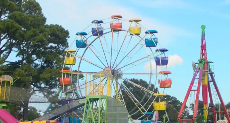 Two girls hospitalized with injuries after falling from Ferris wheel at harvest festival