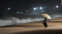 People watch rough waves caused by Typhoon Kalmaegi in Khanh Hoa, Vietnam on Thursday, November 6.