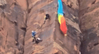 Heart-stopping video shows moment BASE jumper is rescued on Utah canyon face