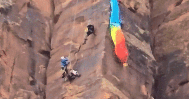 Heart-stopping video shows moment BASE jumper is rescued on Utah canyon face
