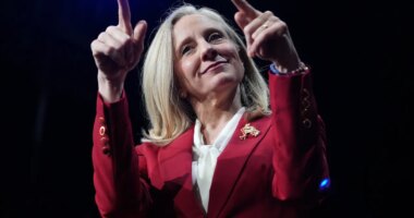 Democrat Abigail Spanberger points out at the crowd after she was declared the winner of the Virginia governor